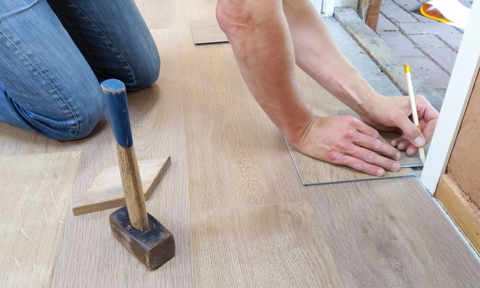 Laminate flooring being laid